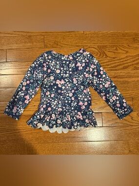 Ruffle Butts Girls' Navy Floral Long-Sleeve Peplum Rashguard Swim Suit Top
